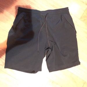 SOLD - Lululemon Navy Lycra Shorts Snap Pockets 8”